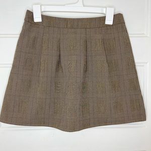 A-line plaid mini skirt with pleats by Sunhee Moon